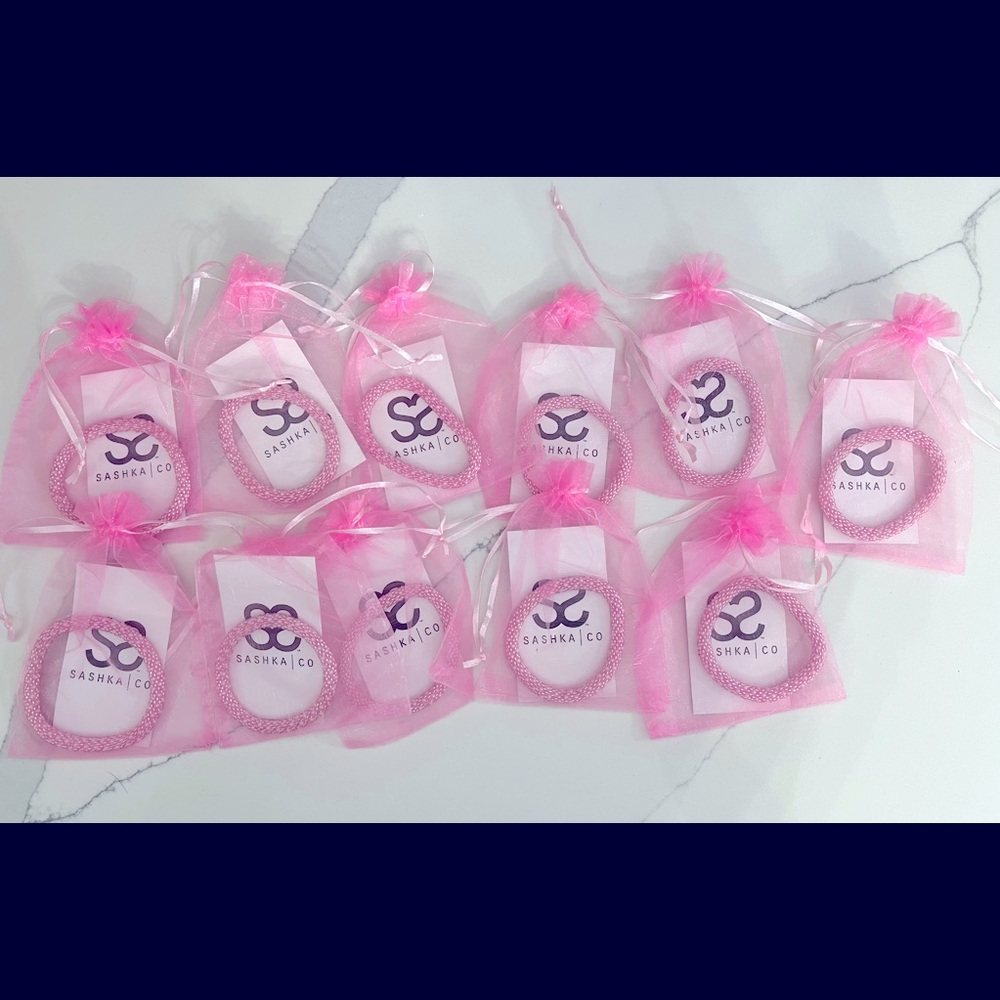 Set of 11 Sashka pink bracelets.